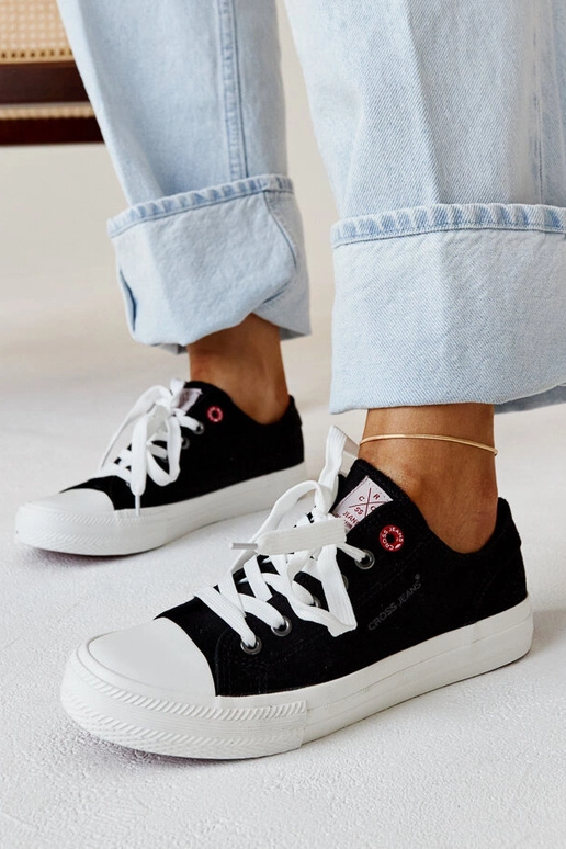 Sneakers til kvinder i sort stof...