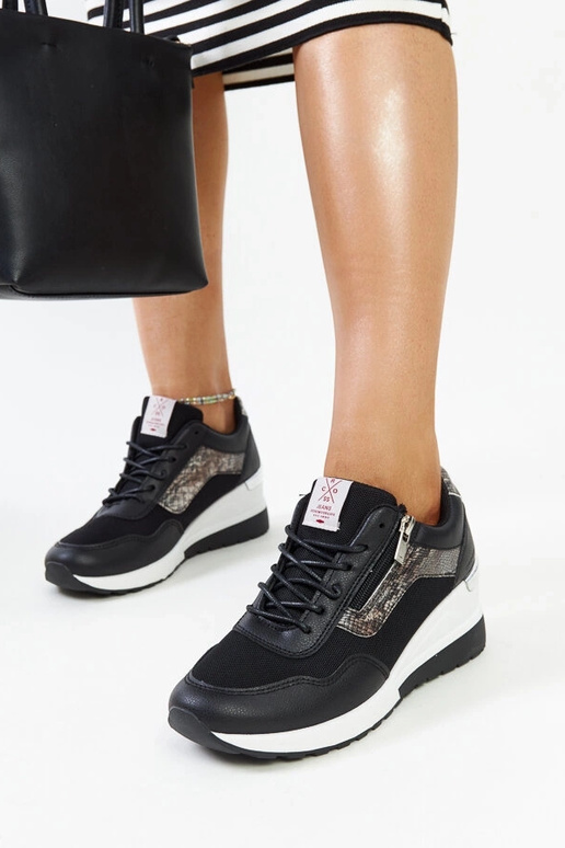 Baskets compensées noires pour femme...