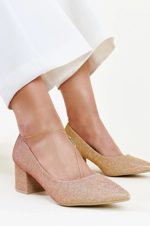 Rosa Glitzerpumps mit Blockabsatz von... Rosa Glitzerpumps mit Blockabsatz von...