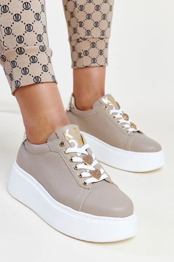Donkerbeige leren sneakers...