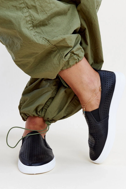 Sorte gennembrudte slip-on sneakers...