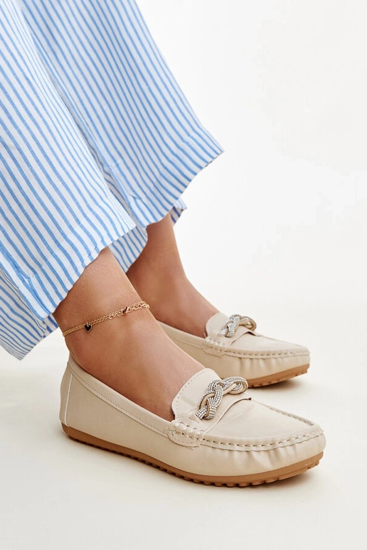 Beige mokkasiner dekoreret med... Beige mokkasiner dekoreret med...