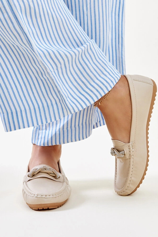 Beige mokkasiner dekoreret med... Beige mokkasiner dekoreret med...