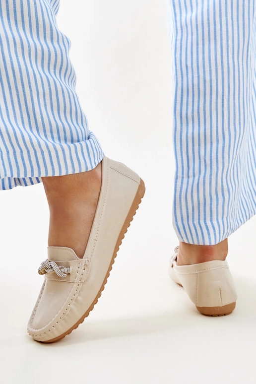 Beige mokkasiner dekoreret med... Beige mokkasiner dekoreret med...