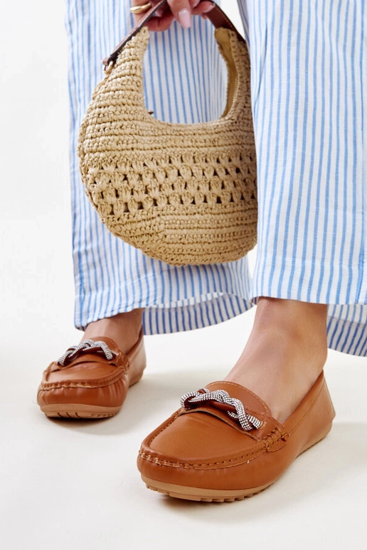 Brune mokkasiner dekoreret med... Brune mokkasiner dekoreret med...