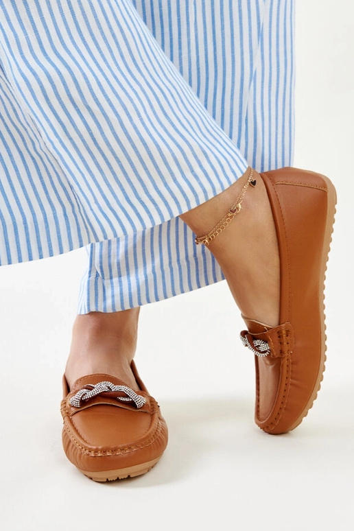 Brune mokkasiner dekoreret med... Brune mokkasiner dekoreret med...