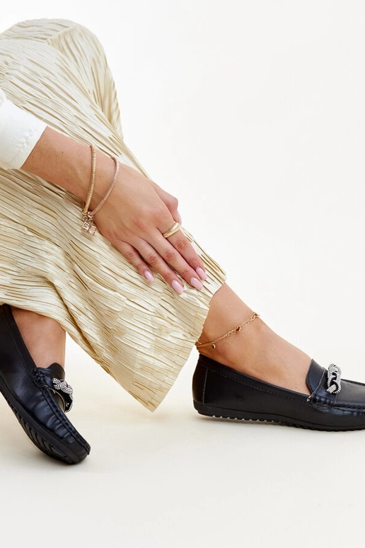 Sorte mokkasiner dekoreret med... Sorte mokkasiner dekoreret med...