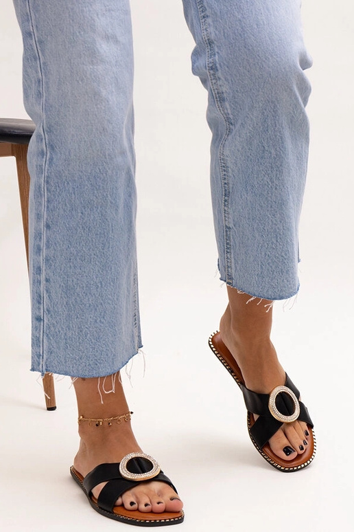 Schwarze Flip-Flops mit... Schwarze Flip-Flops mit...