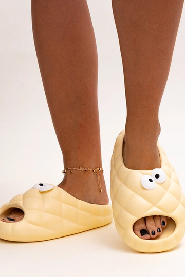 Beige Schaumstoff-Flip-Flops mit Gorges-Augen