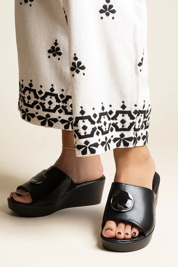 Sandales compensées noires...