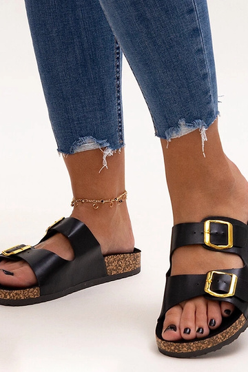 Zwarte slippers op kurken...