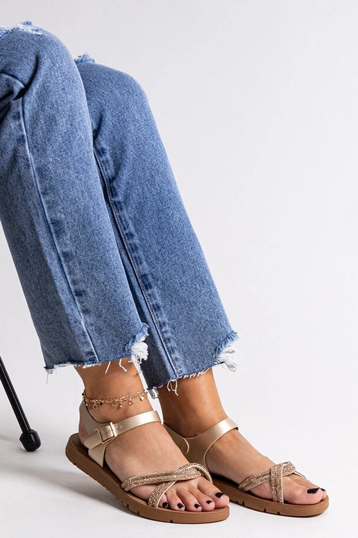 Sandales en or ornées de zircons...