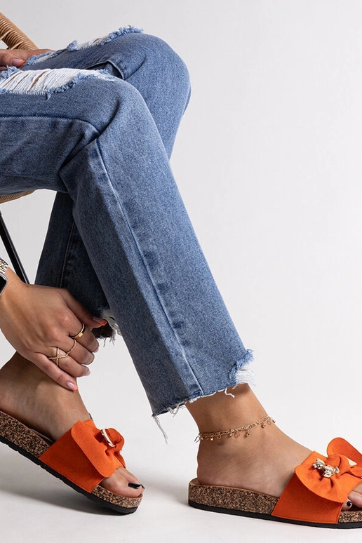 Orange flip-flops med sløjfe og en... Orange flip-flops med sløjfe og en...