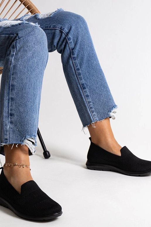 Baskets noires à semelles en mousse...