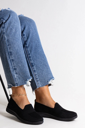 Schwarze Slip-On-Sneakers... 2