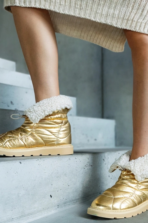 Goldene gefütterte Schneestiefel mit...