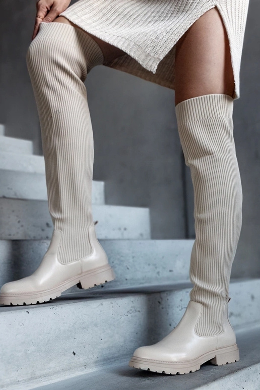 Beige lange laarzen met elastische... Beige lange laarzen met elastische...