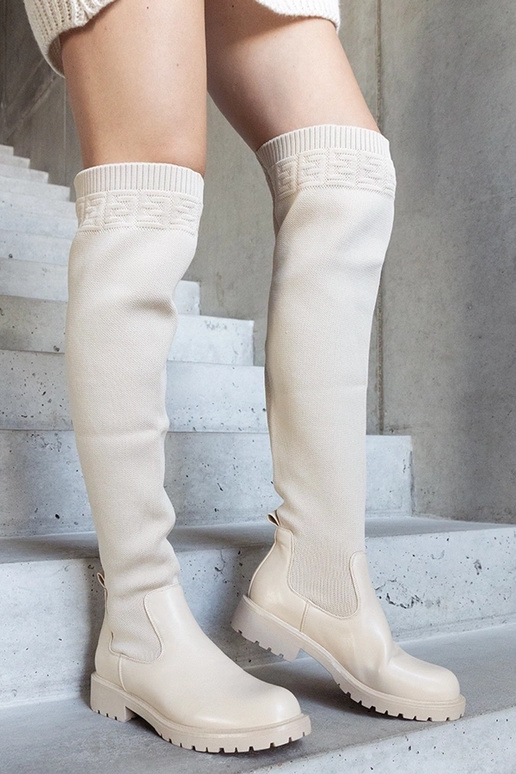 Beige Lange Stiefel mit elastischem... Beige Lange Stiefel mit elastischem...