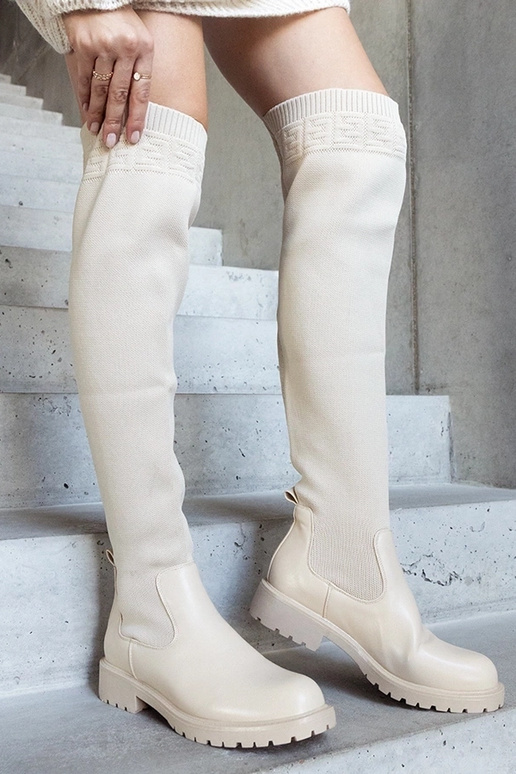 Beige Lange Stiefel mit elastischem... Beige Lange Stiefel mit elastischem...