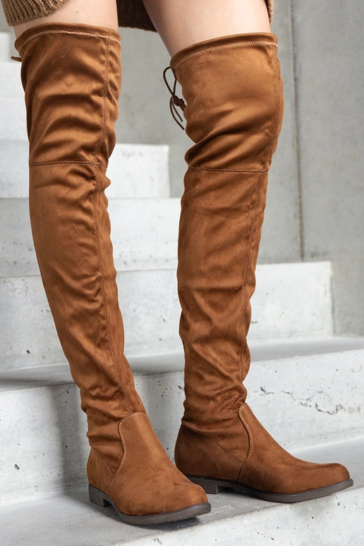 Bottines compensées en daim...