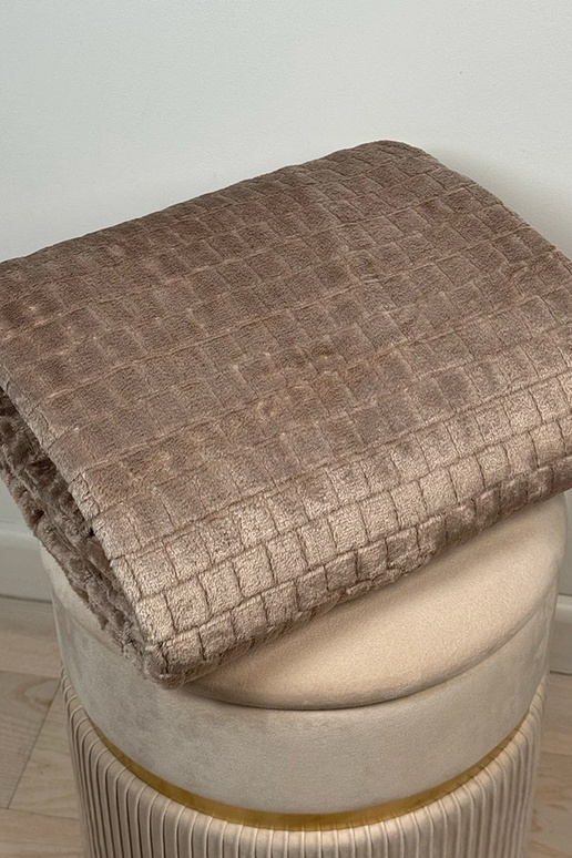 Couverture matelassée beige