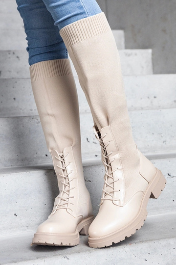 Beige Schlupfstiefel mit...