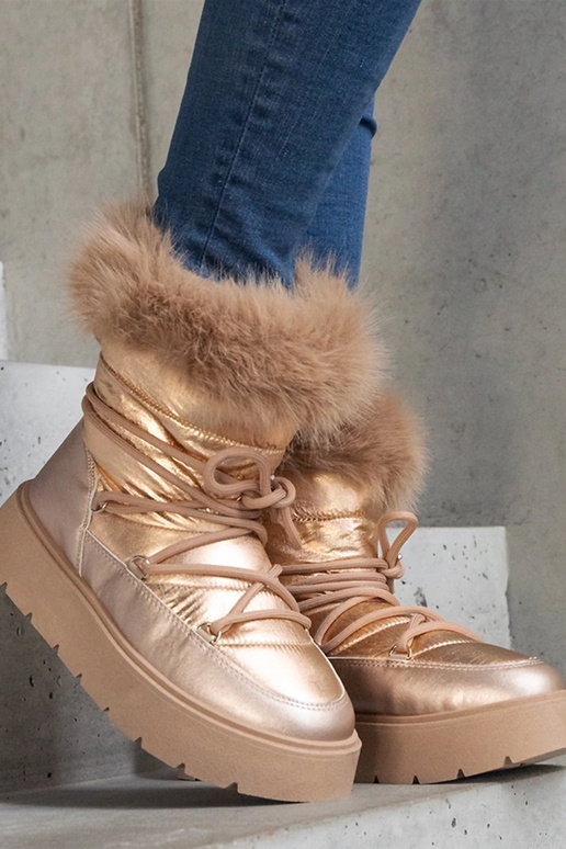 Bottes de neige isolées beiges avec...