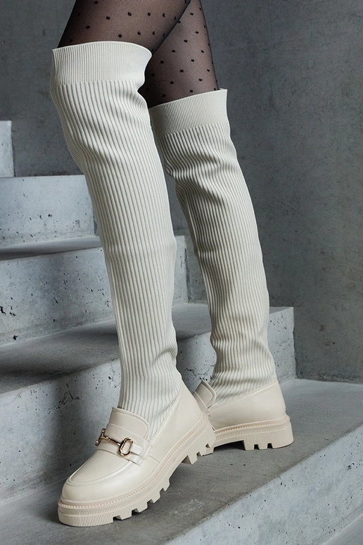 Bottes beige clair avec tige... Bottes beige clair avec tige...