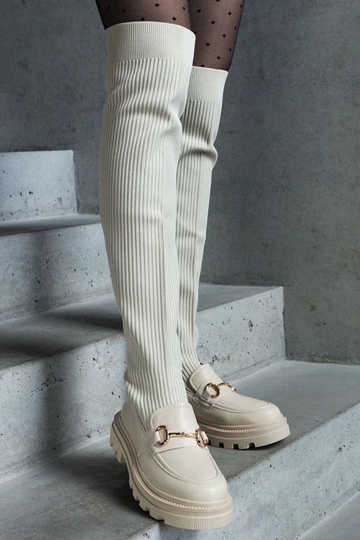 Bottes beige clair avec tige... Bottes beige clair avec tige...