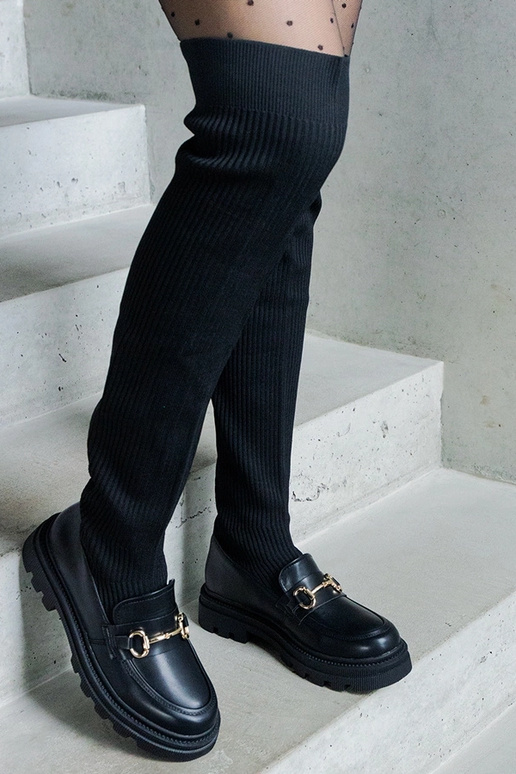 Bottes noires avec tige élastique à... Bottes noires avec tige élastique à...