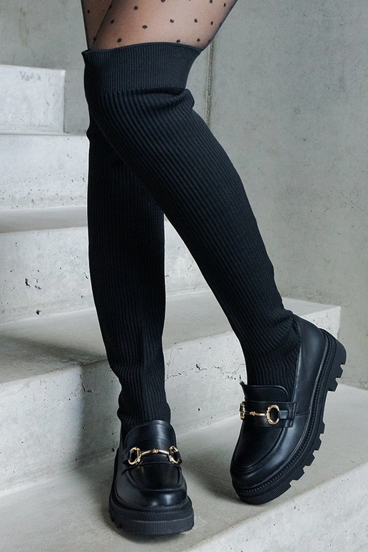 Bottes noires avec tige élastique à... Bottes noires avec tige élastique à...