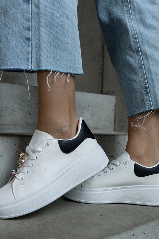 Weiße Plateau-Sneakers verziert mit...