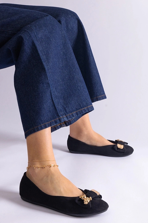 Ballerines noires ornées d'un noeud...