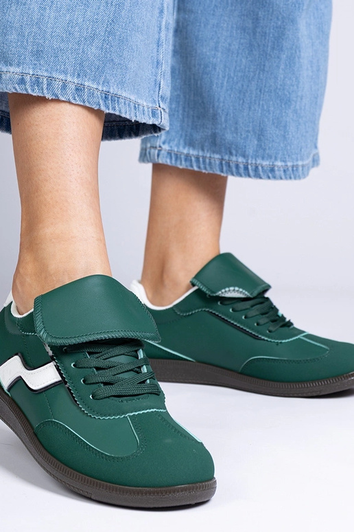 Groene lage dames sportschoenen met... Groene lage dames sportschoenen met...