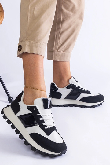 Schwarze Sneaker mit... 2