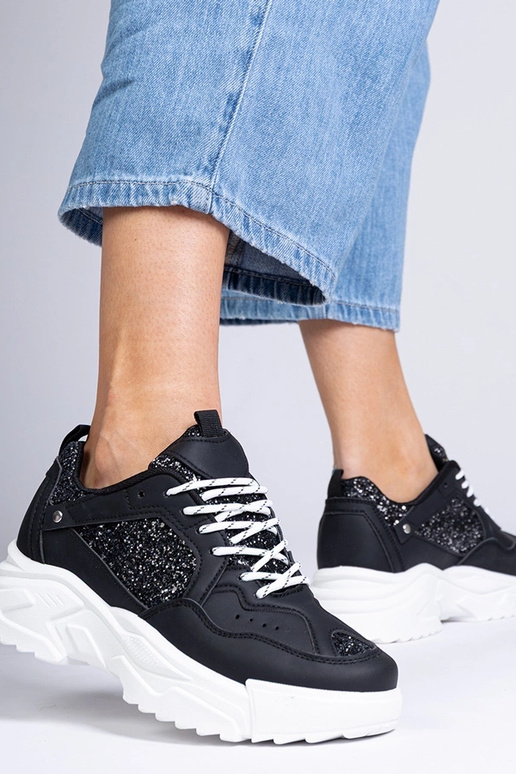 Zwarte dames sneakers met... Zwarte dames sneakers met...