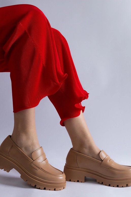 Mørke beige mokkasiner lavet af...