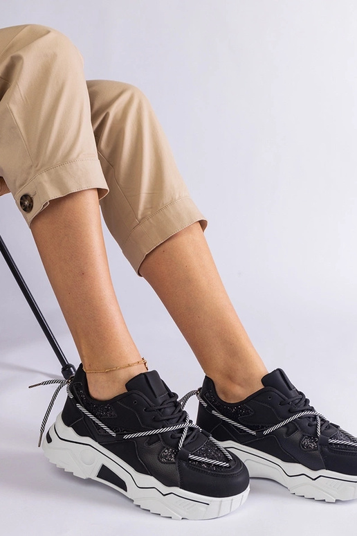 Baskets noires pour femmes avec... Baskets noires pour femmes avec...