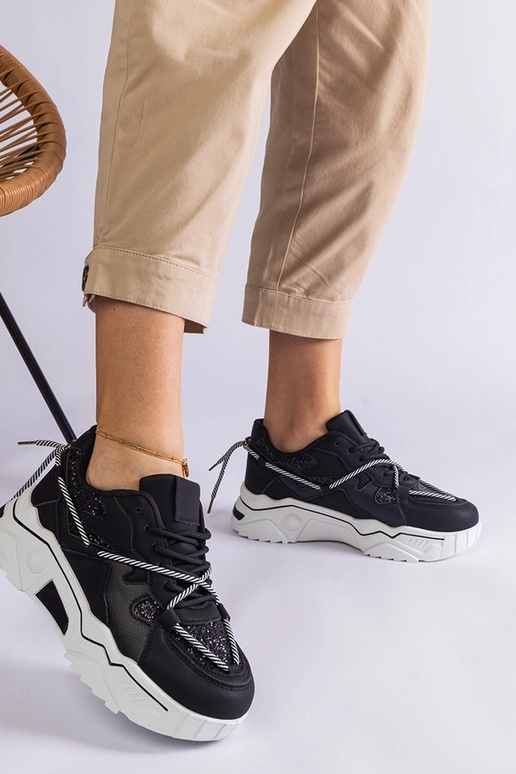 Baskets noires pour femmes avec... Baskets noires pour femmes avec...