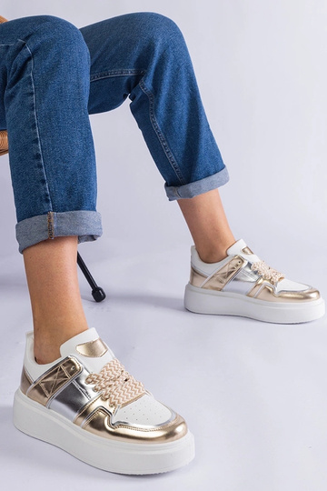 Kimberly guld sneakers med...