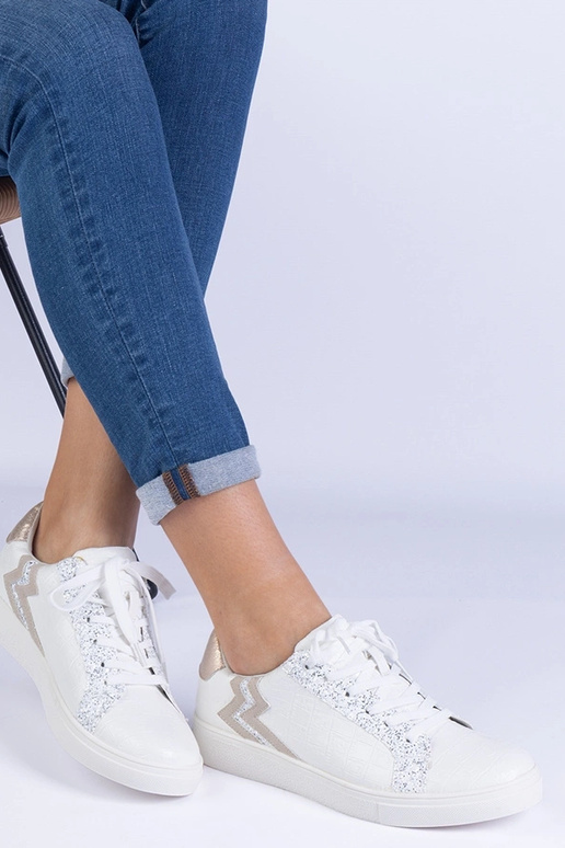 Weiße Damen Sneaker mit Prägung und... Weiße Damen Sneaker mit Prägung und...