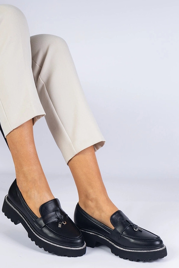 Sorte dame loafers med en...