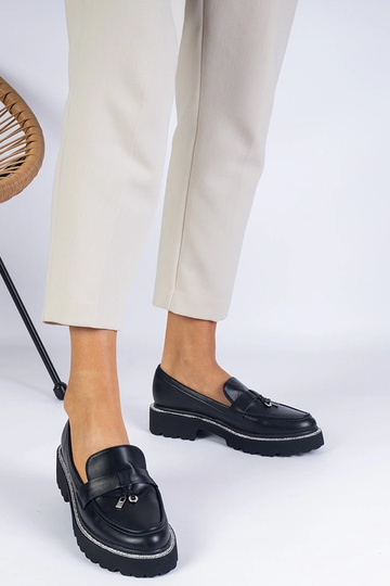 Sorte dame loafers med en... 2