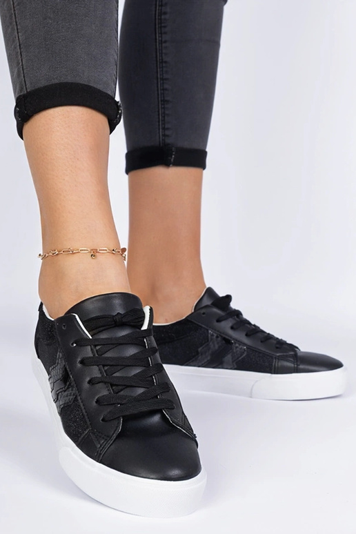 Schwarze Sneakers mit Tiermotiv und... Schwarze Sneakers mit Tiermotiv und...