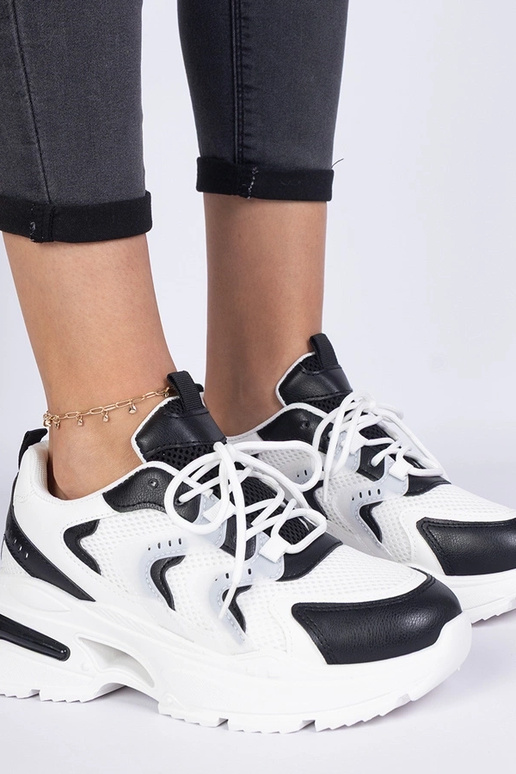 Schwarz-weiße Damen-Sport-Sneakers... Schwarz-weiße Damen-Sport-Sneakers...