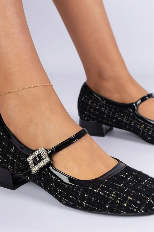 Zwarte pumps met stoffen afwerking en... Zwarte pumps met stoffen afwerking en...