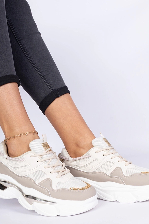 Beige dames sneakers versierd met... Beige dames sneakers versierd met...