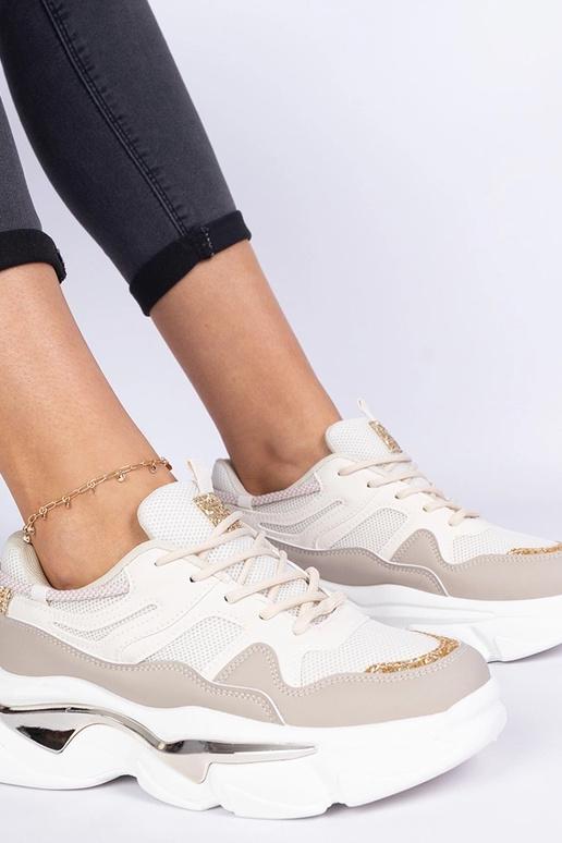 Beige dames sneakers versierd met... Beige dames sneakers versierd met...