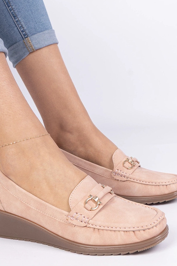 Roze dames mocassins op een... 2