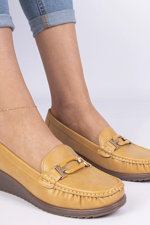 Gele dames mocassins op een sleehak... Gele dames mocassins op een sleehak...